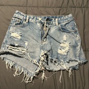 SHEIN Raw Hem Ripped Denim Shorts
